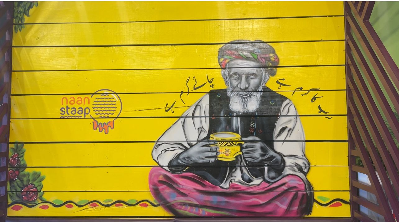 Many chai shops are adorned with murals depicting traditional images related to chai in the Indian Subcontinent