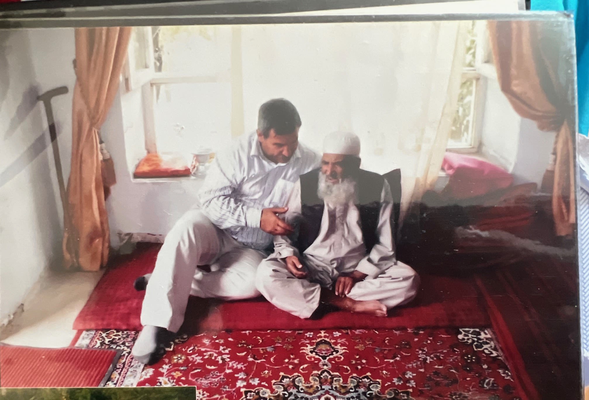 Photo credit: Shabnam Nasimi - Dr Nasimi visiting his grandfather in Ghorband for the first time in 20 years.