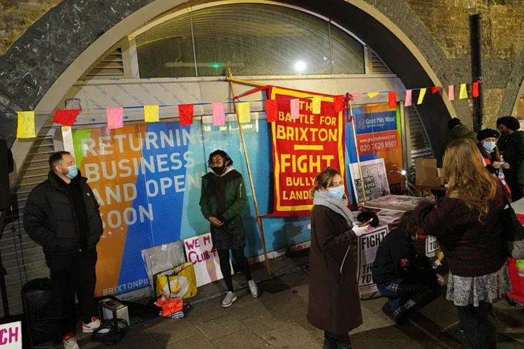 Fight the Tower campaigning in front of Arches shops in Brixton Market 